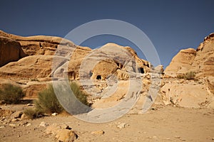 Cave dwellings or homes along the path to the Siq, which is the narrow gorge passage that you walk along to reach Petra, Jordan