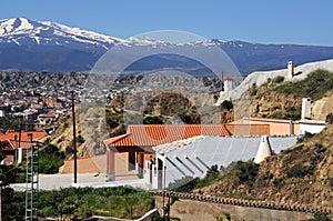 Cave dwellings and mountains, Guadix, Spain.