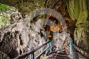 Cave entrance on the island of Catba. Dramatic scenery with stalagmites and stalactites. Trung Trang cave, Vietnam