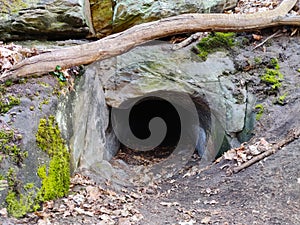 Cave entrance seen from the outside photo