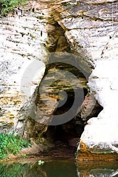 Cave entrance with stream