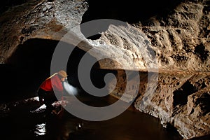 Cave explorer, speleologist exploring the underground