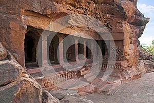 Cave 1 : Facade. Badami Caves, Karnataka, India. Depicting carvings of dwarfish ganas, with bovine and equine heads, in different photo
