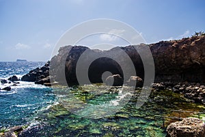 The Cave of Ghar Lapsi in Siggiewi, Malta photo