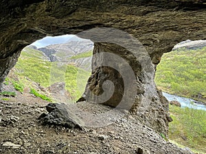 Cave at Glymur waterfall, second highest waterfall of Iceland.