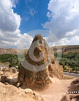 Cave house at the top of a sandstone spire in cappadocia