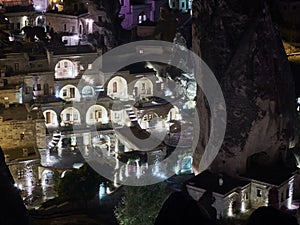 Cave houses and hotels of Cappadocian town Goreme in the night. Long exposure shot