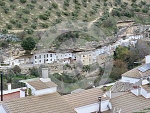 Cave houses under the mountain in Setenil de las Bodegas. photo