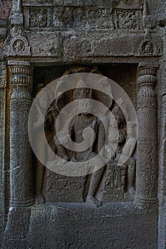 Cave 19 : Left wing of faÃÂ§ade showing Nagaraja snake king and his consort nagini. Ajanta Caves