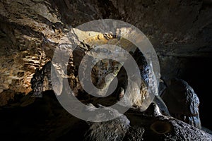 Cave with limestone formations photo