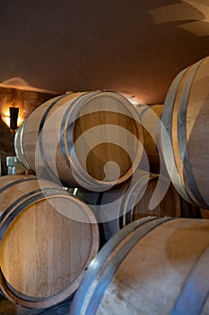 Cave with many  wine casks on wine domain in Cotes de Provence near Collobrieres , region Provence, south of France