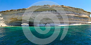 Cave passageway with rocky seashore at Malta, Mediterranean sea