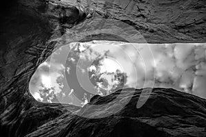 Cave Point Escalante Looking up at the sky from the inside