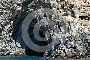 Cave at the Punto de buceo, Tenerife, Spain photo