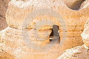 Cave in Qumran, where the dead sea scrolls were found photo