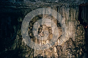 Cave with speleothem, stalactites, stalagmites and stalagnates in Adygeya photo