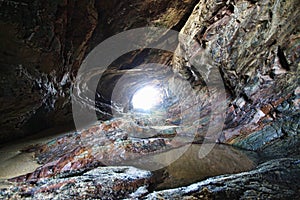 Cave beside Teluk Bidara beach photo