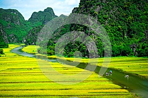 Cave tourist boats in Tam Coc, Ninh Binh, Vietnam photo