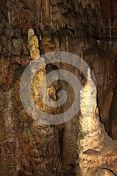 Cave wall, stalagmites and stalactites