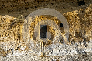 Cave windows of the Cala Blanca beach of the Puntas de Calnegre regional park photo