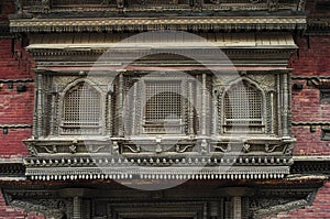 Caved balcony and window of Hanuman Dhoka , the Royal palace , Durbar Square , Kathmandu , Nepal photo