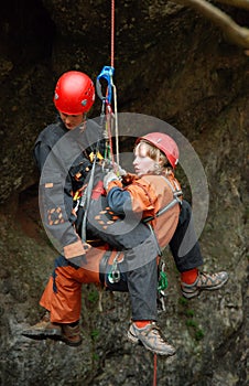 Caver abseiling in a pothole.