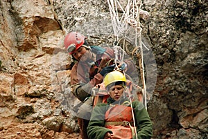 Caver abseiling in a pothole.