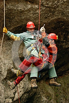 Caver abseiling in a pothole. photo