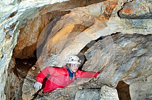 Caver exploring the cave