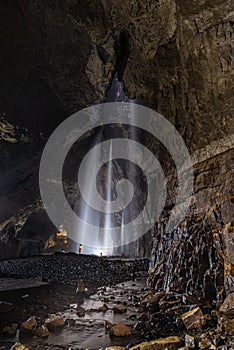 Caver in Gaping Gill Cavern in Yorkshire photo