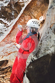 Caver receiving survey data during cave mapping
