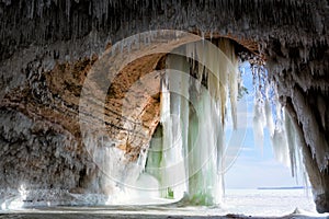 Cavern behind ice curtains on Grand Island on Lake Superior