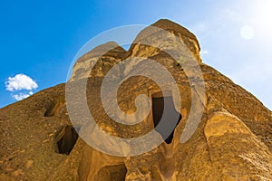 Caves in Fairy Chimneys rock formation Cappadocia Turkey