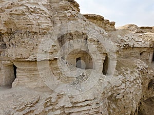 The caves  of the hermits are located near the Deir Hijleh Monastery - Monastery of Gerasim of Jordan in the Judean Desert in