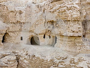 The caves  of the hermits are located near the Deir Hijleh Monastery - Monastery of Gerasim of Jordan in the Judean Desert in