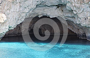 Caves at Paxos island in Greece photo