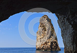 Caves at Paxos island in Greece photo
