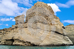 Caves and rock formations by the sea at Sarakiniko area on Milos island,a Greece