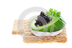 Caviar on crackers photo