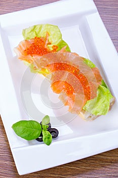 Caviar and smoked salmon sandwich