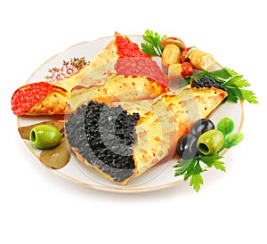 Caviar-stuffed pancakes