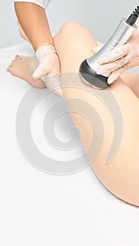 Cavitation rf body treatment. Female ultra sound lipo machine. Spa contouring. Doctor hands