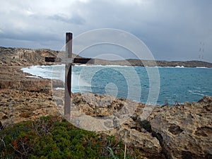 Cavo greko coast with a cross