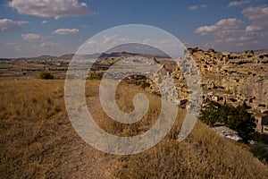 CAVUSIN, TURKEY: Holey or Cheesy rock, church Vaftizci Yahya, Saint John the Baptist. The ancient castle of Cavusin near Goreme in