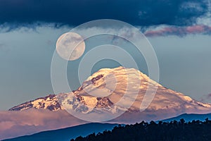 Cayambe volcano with the moon