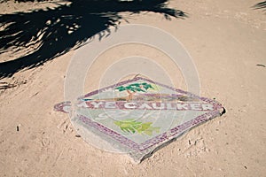 Caye Caulker Island Go Slow Sign on a Sunny Day