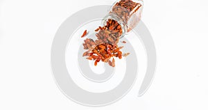 Cayenne Chili Pepper, capsicum frutescens, spice falling against White Background