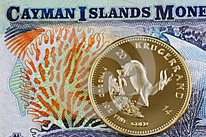 A Cayman Islands dollar with a golden one ounce krugerrand