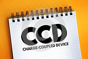 CCD - Charge-coupled device acronym text on notepad, abbreviation concept background photo