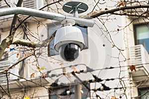 CCTV 360 degree surveillance camera over the road with domed glass